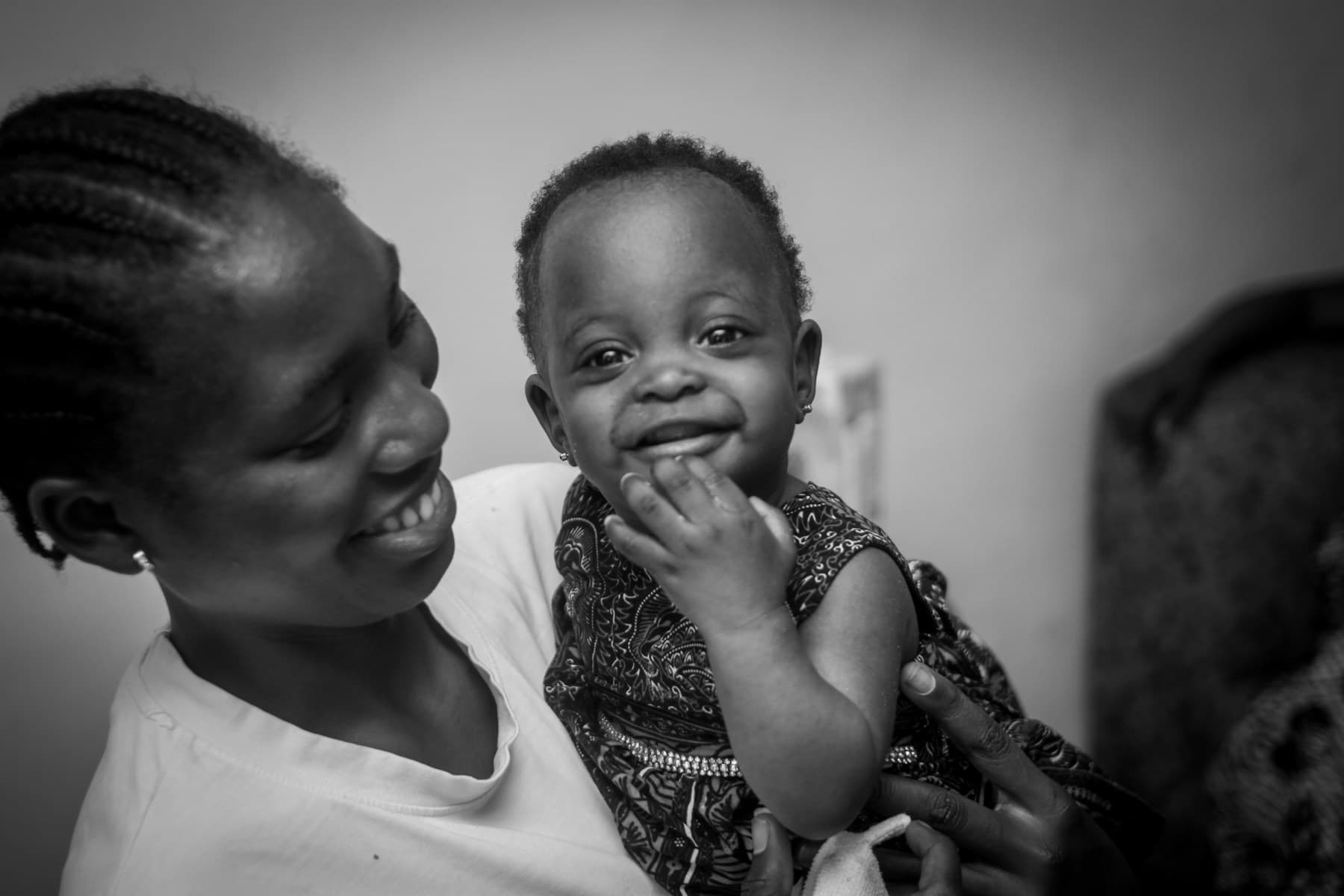 A Nigerian mother holding her child